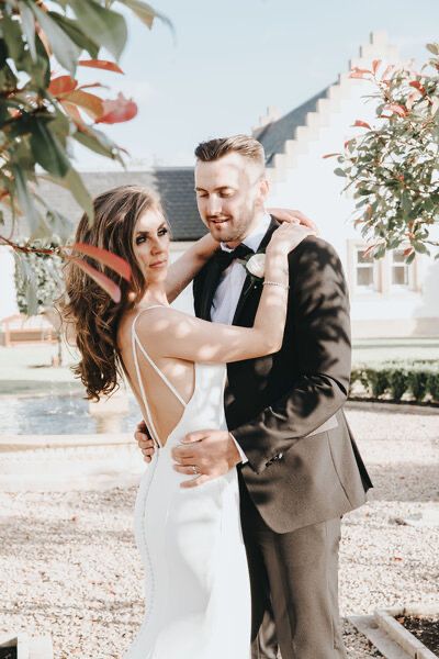 Bride and groom in garden