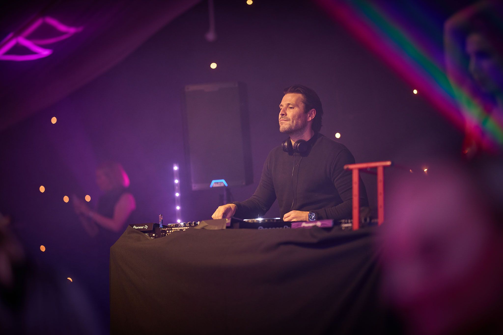 Mark Wright on the decks looking at crowd