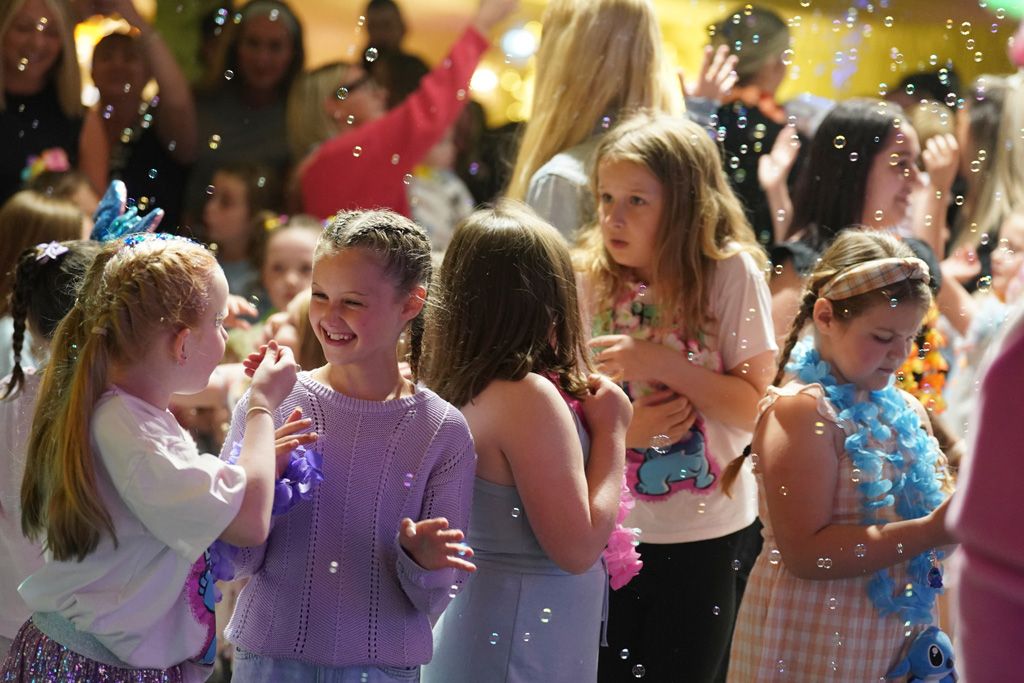 Young girls dancing and smiling