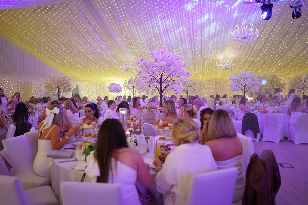 Seated for dinner in the Grand Marquee
