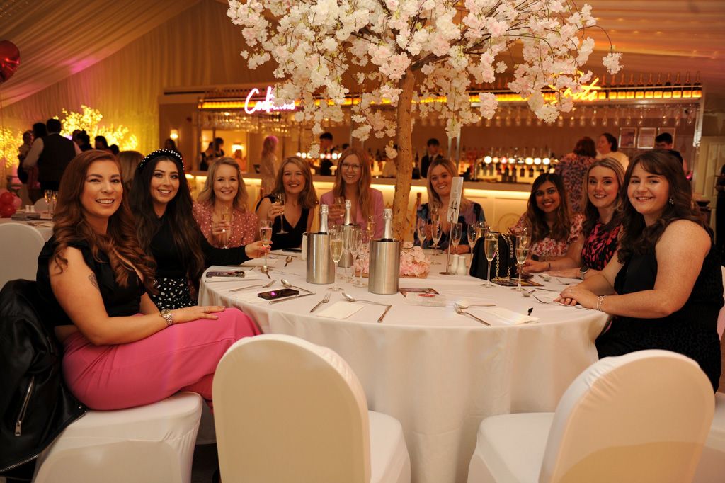 Ladies at dinner table with fizz