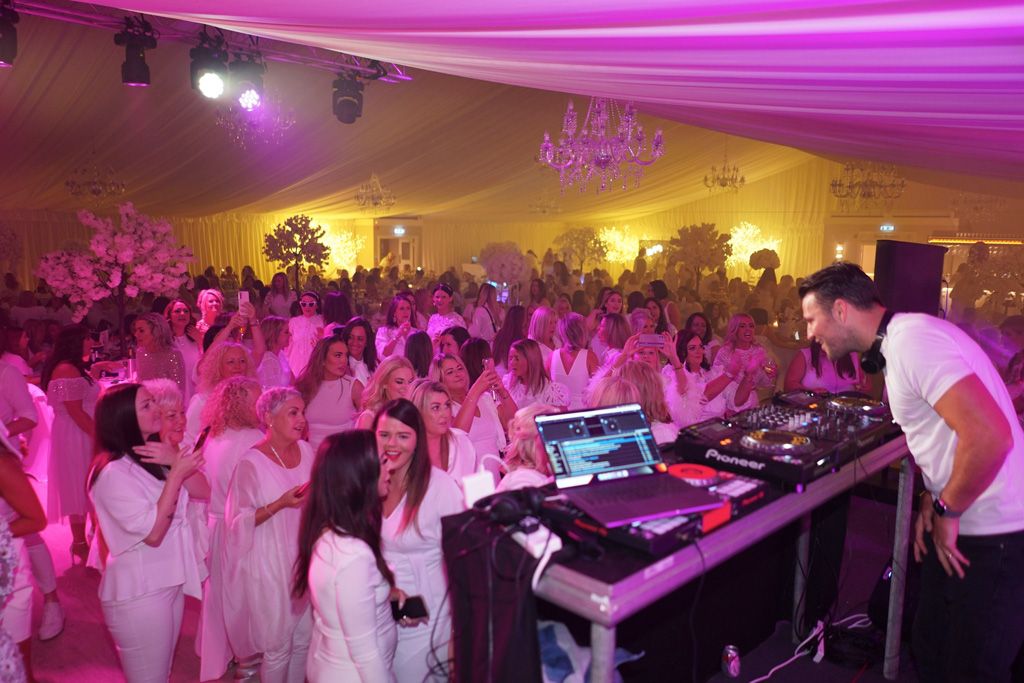 Ladies dancing with Wright on the decks