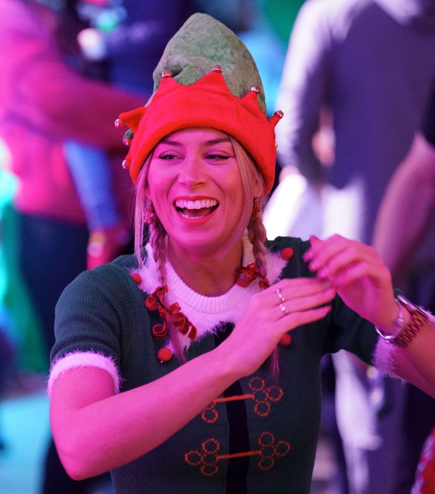 Santa's elf laughing and dancing