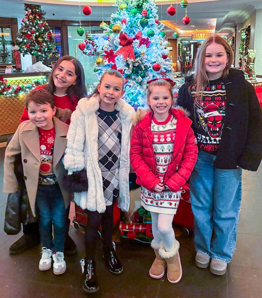 Kids excitedly waiting to get into Santa's Grotto